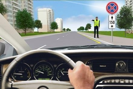 Малюнок до питання 41: Як Ви повинні вчинити в цій ситуації, якщо поліцейський подає Вам сигнал про зупинку?